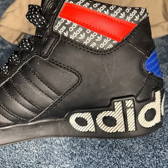 Adidas Black and Blue Sneakers with Sporty Design
