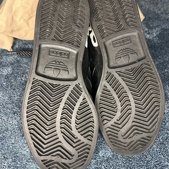 Adidas Black and Blue Sneakers with Sporty Design
