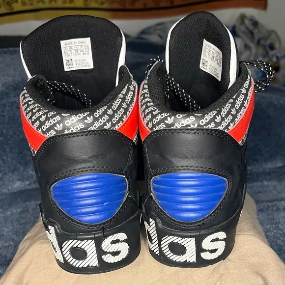Adidas Black and Blue Sneakers with Sporty Design