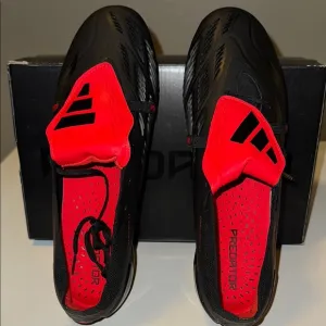 Adidas Black and Red Athletic Shoes for Optimal Performance