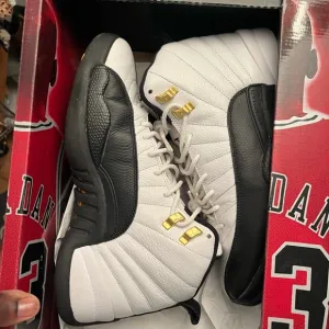 Air Jordan Taxi Men's Black and White Sneakers