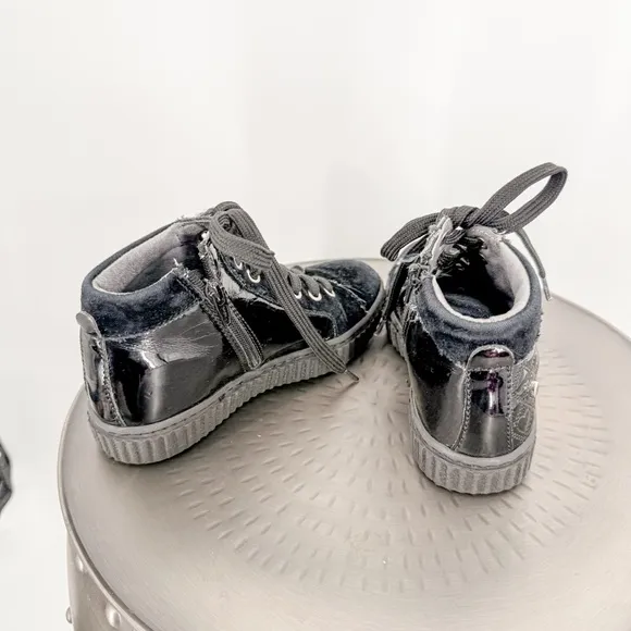 Black High-Top Boots with Lace-Up Design