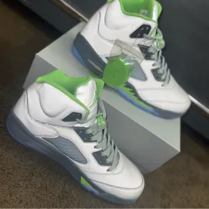 Jordan 5’ green been’. White and Green Athletic  Shoes with Mesh Panels