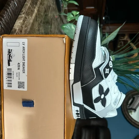Louis Vuitton Black and White Sneakers with Skate-Style Silhouette