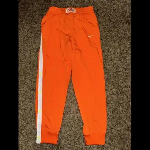 Nike Culture of Basketball Kids' Tear-Away Basketball Orange Trousers Sample