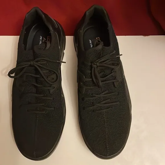 SKECHERS, Excellent condition men’s size 12 laced slip on athletic shoes.