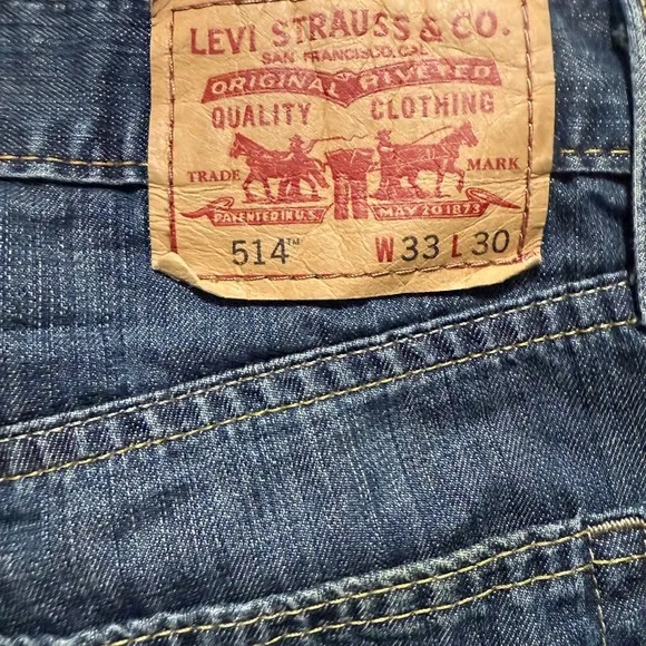 Vintage Levi's 514 Jeans  Straight Fit Blue Wash Distressed Worn Look Classic